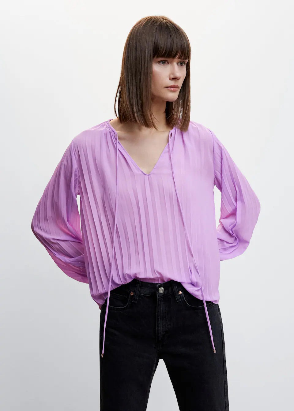 Pleated blouse with puffed sleeves