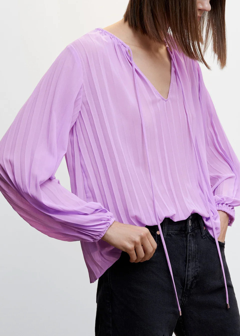 Pleated blouse with puffed sleeves