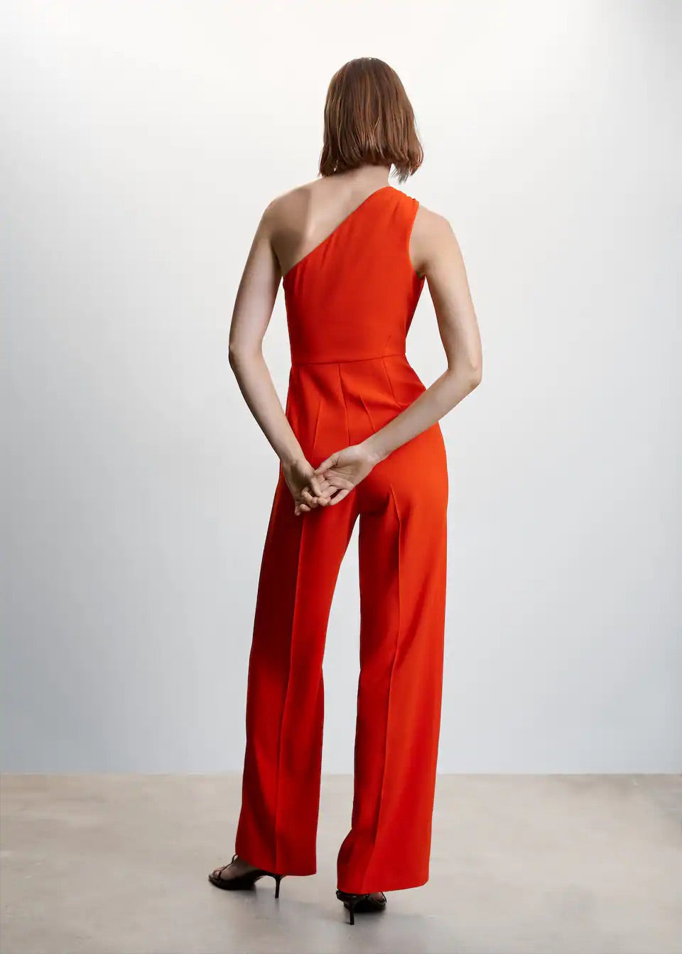 Asymmetrical jumpsuit with metallic detail