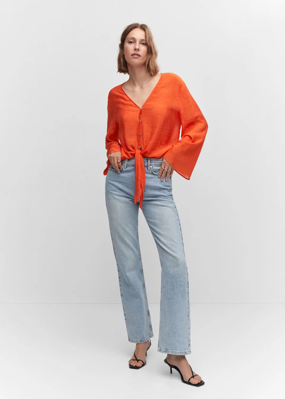 Flared-sleeve blouse with bow