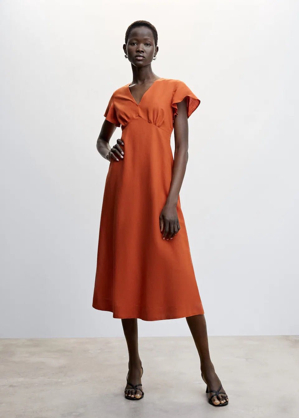 V-neckline dress - Laurel Morgan